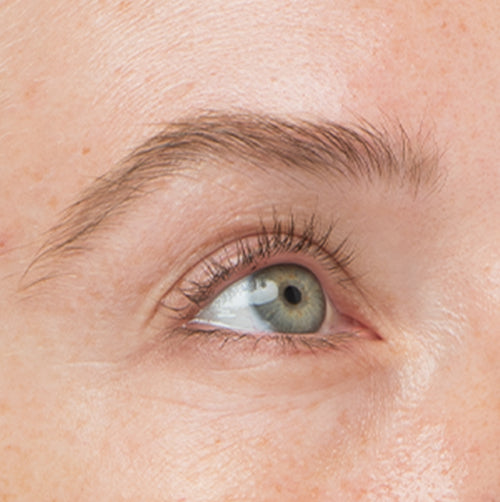 After photo of a woman with fuller looking lashes and brows