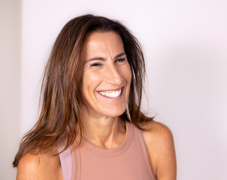 NULASTIN brand ambassador smiling from success using NULASTIN eyebrow serum