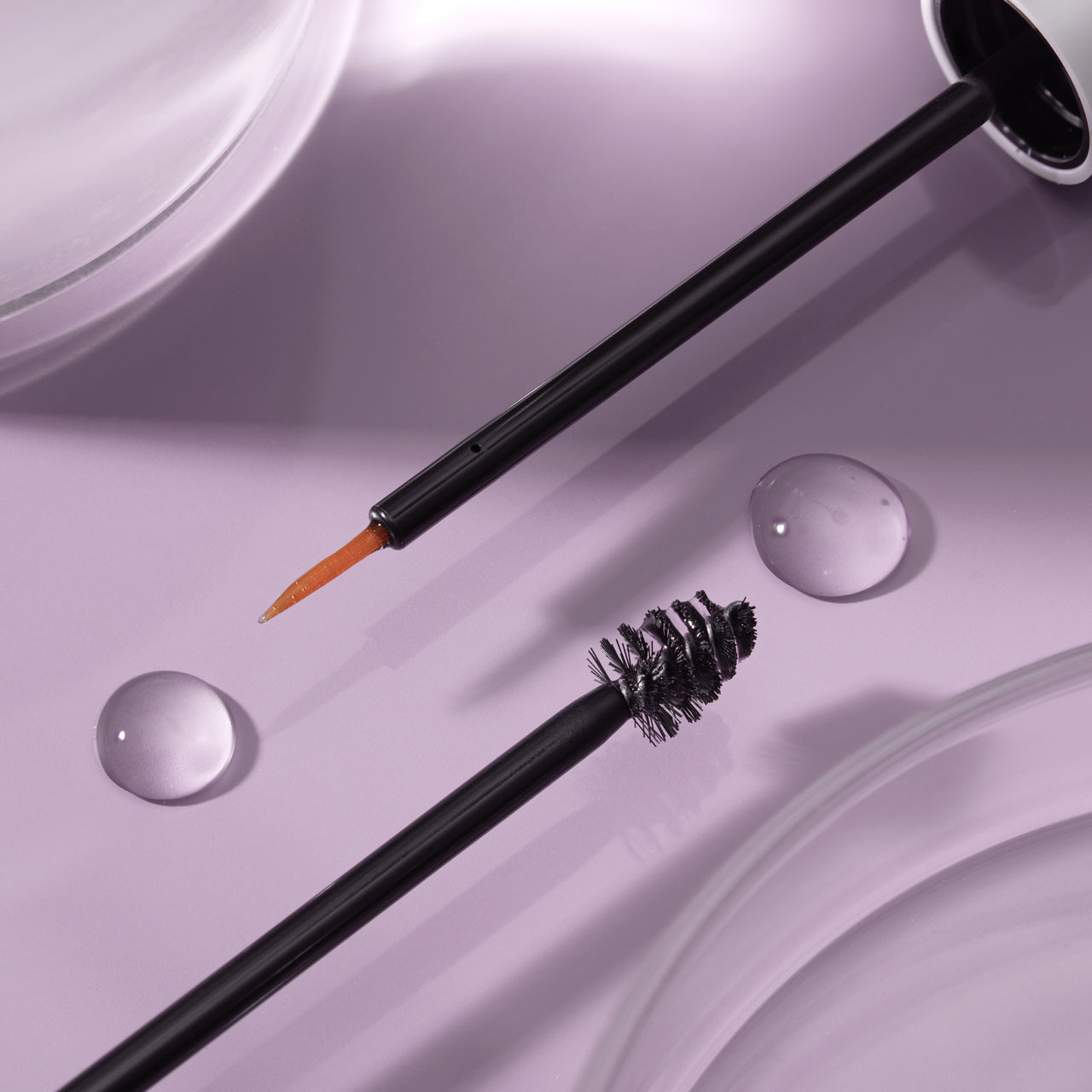 Close up look at lash and brow serum applicators