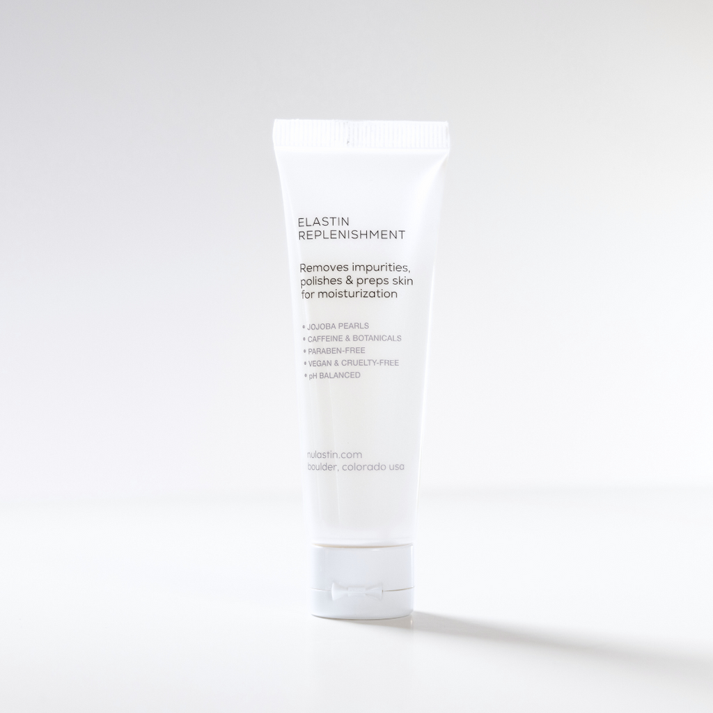 Back of NULASTIN travel size cleanser bottle against white background