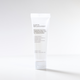 Back of NULASTIN travel size cleanser bottle against white background