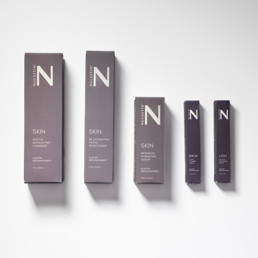 Five NULASTIN packaging boxes against white background 