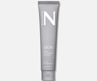 Front view of SKIN Dermal Rejuvenating Cleanser tube showing gray packaging and flip-top cap on white background