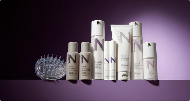 Nulastin product collection on ledge with purple background