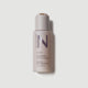 Bottle of sulfate free and color safe Nulastin Repair & Hydrate Shampoo with elastin replenishment