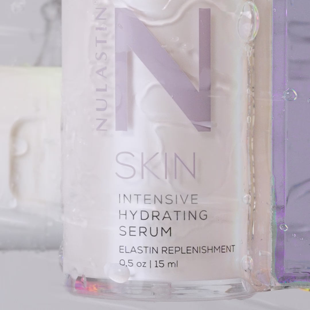 Video of skin moisturizer covering top of bottle in reverse against white background